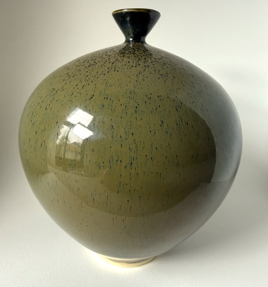111. Olive Green Speckled Vessel