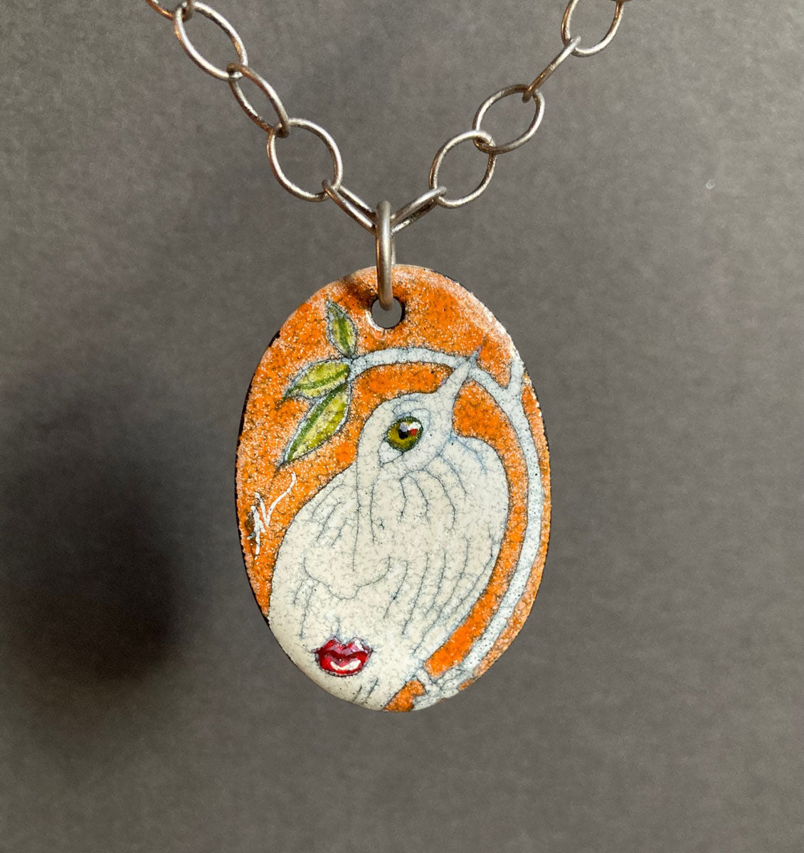 302. Bird w Face Enamel Pendant