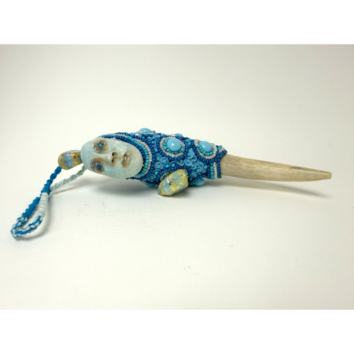 3. Blue Face with Elk Antler Talisman