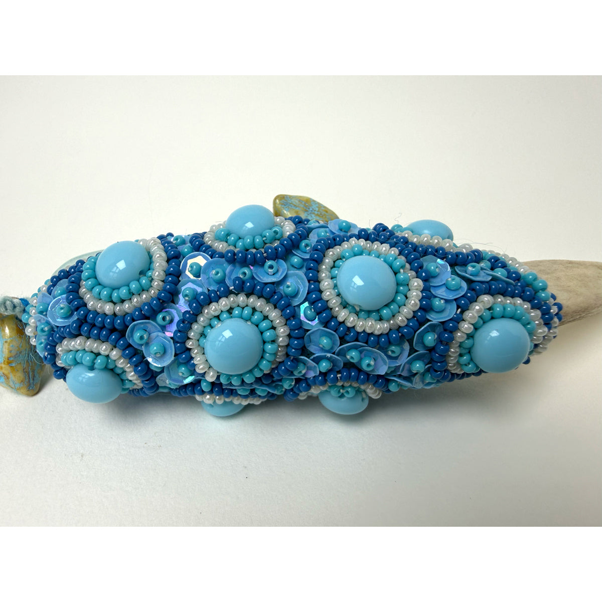 3. Blue Face with Elk Antler Talisman