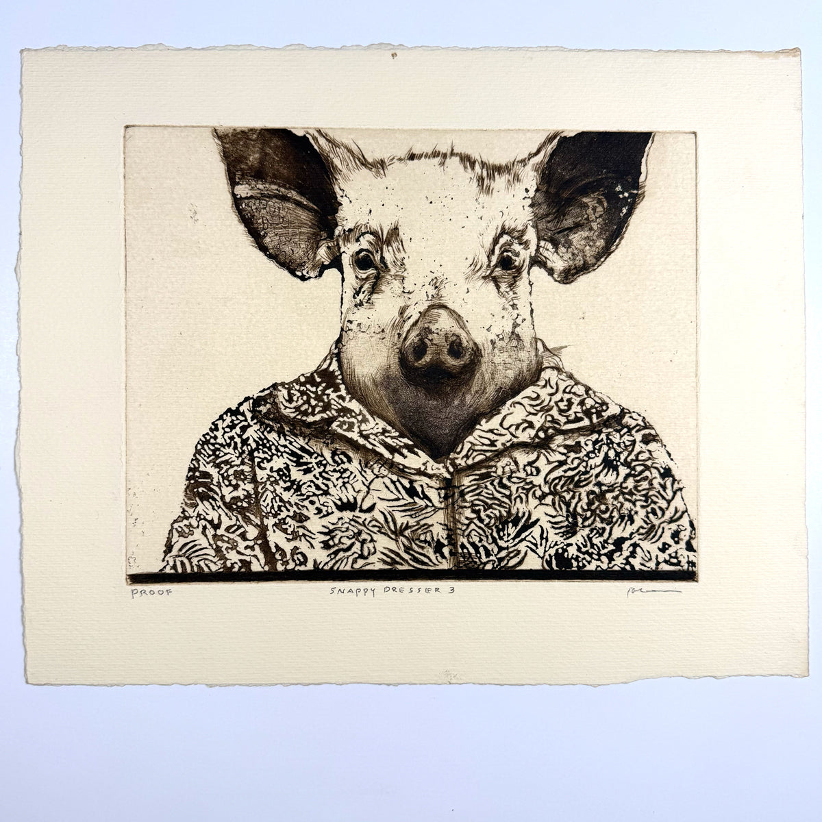 Snappy Dresser by Liza Jones, a black-and-white drypoint proof of a pig wearing a patterned shirt